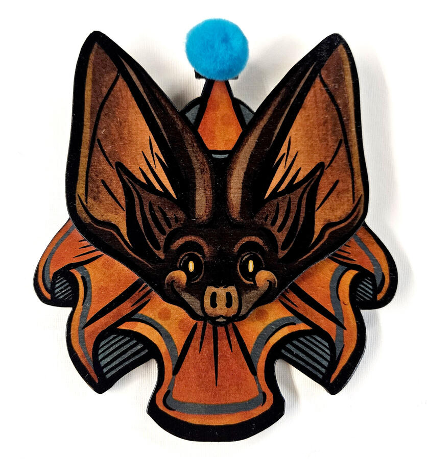 "Clown Bat" made with wood and pompoms
